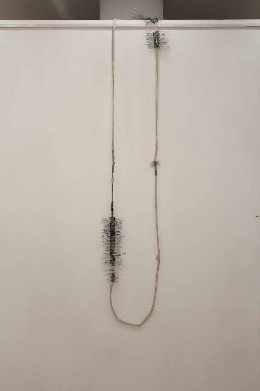Sara Al Haddad, if i had it all, 2013, mattress outline and wire, variable dimensions. SOLO: i know, i knew, at DUCTAC, Dubai