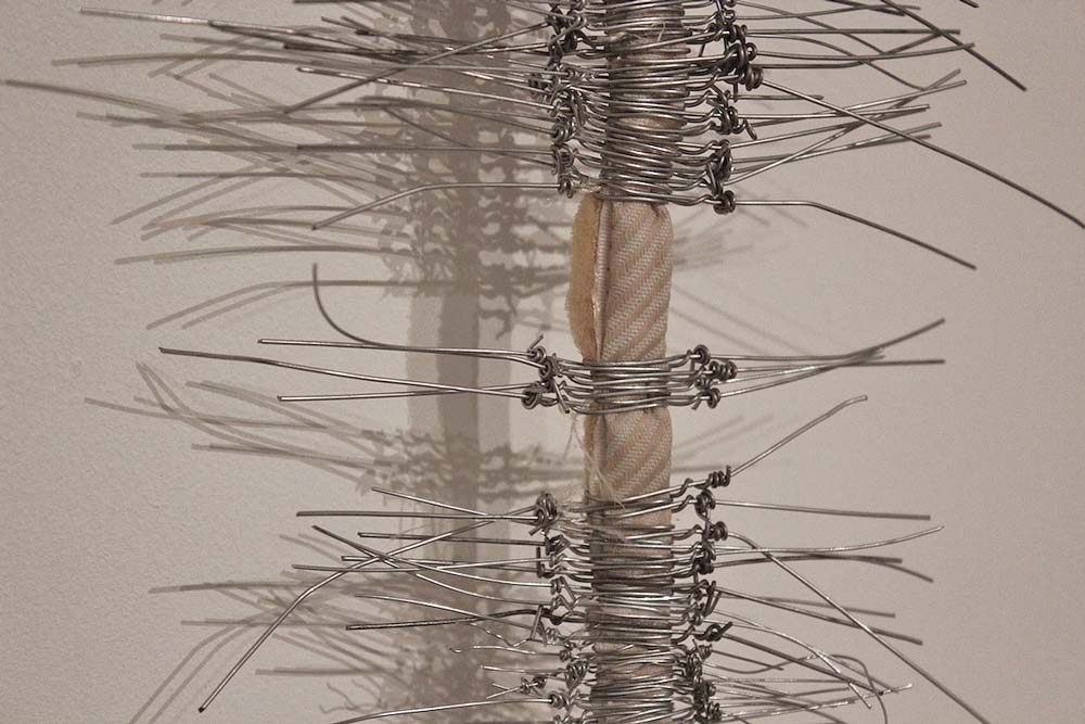 Sara Al Haddad, if i had it all, 2013, mattress outline and wire, variable dimensions. SOLO: i know, i knew, at DUCTAC, Dubai