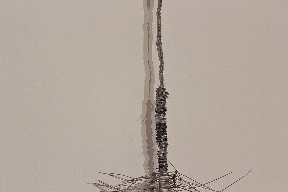 Sara Al Haddad, if i had it all, 2013, mattress outline and wire, variable dimensions. SOLO: i know, i knew, at DUCTAC, Dubai