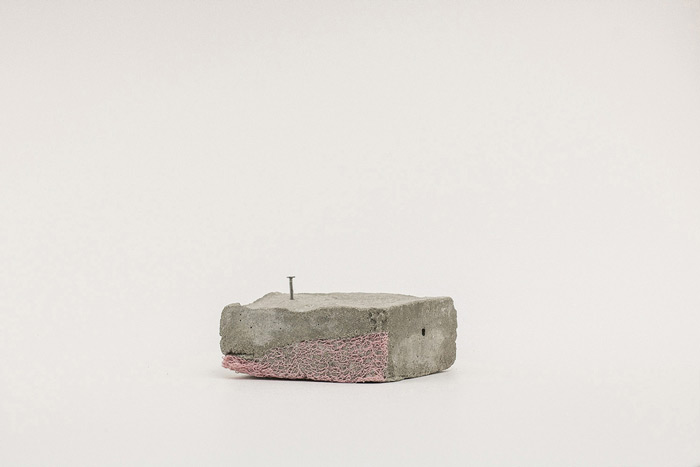 Sara Al Haddad, for self destruction #27, 2014, concrete_8.2x7.6x3.5cm, nail_1.05cm, concrete, nail and crocheted embroidery thread. Photo: Marwah Al Haddad