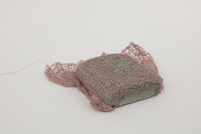 Sara Al Haddad, for self destruction #30, 2014, concrete_6.1x5.1x1.85cm, concrete and free form crocheted embroidery thread. Photo: Marwah Al Haddad